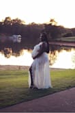 I loved this dress. It was perfect for my maternity shoot. The only thing I wish I did differently is get the straps adjusted so that my stick on bra didnt keep showing since it kept sliding down I'm assuming due to the bodysuit. Other than that it was perfect and the material was good quality - Charlene J.