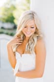 This is a beautiful jumpsuit for any occasion. I wore it for senior photos and it photographed so pretty! I am petite, so I had to have it hemmed, but other than that, it was a perfect fit! - Melanie M.