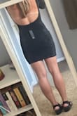 This dress is so comfortable and fits perfectly! I was nervous that the shoulders would slip off since it's backless, but they feel secure. The material does snag easily though- be careful. - Madeline D.