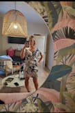 Very light and feminine. Perfect for a night out in Miami Beach. The ruffle stuck out a but too much for me so I just pinned it down with a safety pin. - Megan H.