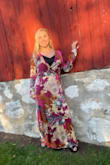 This was a beautiful silk dress. So many compliments. It was a little tricky trying to get the right look in the bust (really open) due to its wrap dress features but with the right slip under it wasn't too revealing.
It flowed and I felt so pretty. - Jessee O.