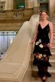 I had a black tie optional wedding and this was perfect! The floor length hem kept it formal but the mesh legs kept it young and fun. Lots of my family and friends doubted the floral and frills for me but I had faith and they saw it day of and said yes that is a great dress. 

I used 2 safety pins to lock down the top drill inside the bust a bit and if I could do it again I'd probably either sew down the black top grill in a few keys places. 

It did show up wrinkled and that material is almost impossible to de wrinkle even having it on a hanger while I showered twice. Luckily I doubt anyone else would notice on the black and if so it looks intentional on the frills.

I have a bigger bust on a small waist (30DDD) so the straps being adjustable was perfect to reveal just what I wanted. Be very careful tightening that strap I could tell it was a 'this could be broken pretty easily' type thing and then the dress would be ruined, but if you're careful setting it up it stays put and it's fine. Loved it! - Kitty H.