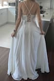 Such a cute dress with strings to pull tighter, fits perfectly. A little bit long but great if you're going to wear any kind of heel. Very comfortable good quality material - Danielle D.