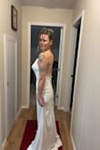 I Ordered three potential wedding dresses and decided to keep this one as a strong possibility. It's fancy enough but also simple enough for my beach wedding. Fabric, detailing and length are all absolutely perfect.
My only criticism is that the dress is a bit heavy to be held up by spaghetti straps- I have a feeling they'll dig into my shoulders as the day progresses. If I go with this dress I might alter it such that it is essentially a strapless dress with straps if that makes sense...

Beautiful dress all in all and it might be the one I end up wearing :) - Leah K.