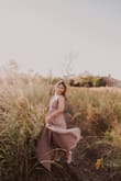 This dress is so dreamy. Elegant, flowy, simple yet capturing. I got it in taupe since I have an olive complexion. Totally suits me! I bought an XS because my cup size is pretty small, so the straps stay better, and my rib cage isn't that wide. The dress is a bit long for my height (5'2") but I'll keep it flowy like this. Got it for a family photo shoot but know that I will wear this dress to any event! - Laila R.