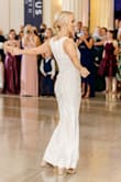 I bought this dress 2 weeks before my wedding as a panic purchase worrying about dancing in my 1st wedding dress and being uncomfortable. It was so comfortable and easy to dance in and I got so many compliments! Definitely looks more expensive than it is. The only alteration needed was the hem (the hem came out too short because I thought I would be in flats by that time). Used a sticky bra. I did get some scratches on one of my arms from the sequins but that may be due to all the dancing. - Katherine H.