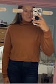 The front of this sweater is so cute, but when I bought it I didn't know there was an open back. It is really not flattering for me and I wouldn't be able to wear a bra with it. - Nicole I.