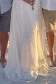 This dress is so flattering and was the perfect dress for our beach wedding!  The fabric is top qaulity and the dress is well made. - Elizabeth L.