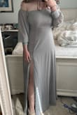 The material was smooth, the fit was super flattering, and the sleeves can be worn comfortably off the shoulder and on. I would recommend wearing heels or platforms because it is very long. - Alta T.