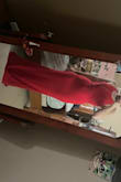 Has a slip under the dress. Super comfy and lasted all night at the military ball. Longer so will need heels or hemming. - Andrea H.