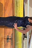 I'm obsessed with this dress! The color is a bit lighter than navy in my opinion, and is a perfect deep blue that makes the dress versatile for many occasions. It has a flattering line and band at the waist. I love the way the bottom flows and moves with you as you walk. The sequins are not heavy and add such a glamorous touch. It fits true to size but is very long; I had to have 3 inches taken off the bottom. - Michelle S.