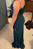 If you like a tight fit, this dress is the dress for you. I'm very curvy and short and an 8 fit perfect. It definitely elongated my body too. - Cheyenne H.