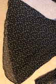 I bought this dress for a wedding in Duluth and got compliments on it. I love the idea and look of the dress but I was disappointed in the execution. On one side, the stitching is pulling, and looks like the seam is ripped slightly. Since the dress is black I wasn't too concerned. However, after trying it on a few times and looking at the back, I noticed the back of the dress is completely uneven. It's disappointing because this is my first order from Lulus and I've only ever heard good things. The dress also felt like it ran slightly smaller than my "normal" sizing. The dress itself is really cute but not sure I'd order again from Lulus since it seems like their pieces are made cheap and in a hurry. *I've added a picture of the back, it's really noticeable which is why I'm annoyed. - Rochelle S.