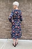 I had lost my husband of 63 years and needed a dress to wear to his funeral. I had lost weight and did not have a dress that fit. My daughter and I shopped 20+ stores, even checked out used clothing shops without success. I could not find anything modest that still looked nice. She looked online without success, until she found Lulus. I always have to try on a number of dresses to find one that fits and I said, "don't bother; I'm sure it won't fit, and we won't have time to return if for a different size." Well she "bothered." She saw this dress and ordered it, and to my amazement, it fit like it was made for me. I had tears in my eyes when I looked in the mirror, it was so beautiful. It is well made and I love the material- plus it doesn't wrinkle. I have already started spreading the word about Lulus. - Joyce P.