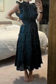 I absolutely loved this dress for a cocktail attire wedding. Fits true to size but does have a good amount of stretch if needed. I'm usually between a small and a medium but went with the small and it was perfect. A tad bit scratchy around the neck but nothing terrible. - Katie C.