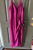 The model pose is making the dress looks like it lays nicely. But the ruched fabric in the front panel lays like a baggy sack. The lining fits like expected for a medium so it isn't a size or shape issue there, but the top fabric is about 2 sizes too big and creates a deflated balloon look at your belly.  I had to get into my sewing supplies to disassemble the dress at the lining slit attachment and take up the extra panel fabric in 2 places so it lays the way you'd expect ruching to do without a leg kick. Kept the dress because of the color and fabric, but it was designed oddly or someone grabbed the wrong panel in the assembling of the dress. Glad I have a sewing station for this one! - Jenna R.