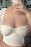 It's stretchy enough to fit perfectly! I could have gotten away with a large as well if I knew how stretchy it was but it fits great! - Gigi P.