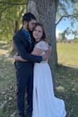 Beautiful dress! Ordered it with 9 others for my little sister's quick wedding day. This one was her favorite and it turned out beautiful. She's normally a medium and we ordered a large to be safe. I'm happy we ordered up a size. - Hope C.