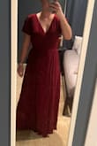 This dress is so flattering! I will be wearing it to a wedding this weekend, and it arrived way sooner than I expected it to! It is slightly loose on my bust and it's long, so I will be using dress tape and wearing large heals. - Emilee H.