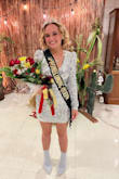 The sparkles, puffed shoulders and classy cut made this dress PERFECT!  My daughter wore this dress to homecoming and it was a show stopper!! We did have the dress altered just a bit due to my daughters very petite body type, but I do feel the dress was true to size. I highly recommend it his dress! - Samantha B.