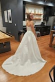 I am SO excited to wear this on my wedding day. An absolutely gorgeous dress that makes me feel like a queen. I could not find anything else for this level of quality for the price. The detail of the bust is breathtaking with the ferns and it fits like a glove for my somewhat boxy frame. The slit is a little high but with hemming, it will be perfect for my big day. - Kaitlyn B.