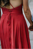 This dress is so flowy and flattering, the corset back makes it super easy to adjust to how you want it to fit. If I wanted it more cinched in, I can tighten it, if I want to be a little more comfortable I can loosen it. I wore it for my engagement shoot! It's super cute and has good movement and I didn't need a bra! I wore nip covers with the dress. One thing to be aware of is that it creases pretty easily, so just be careful of how you sit in the car lol
I love it though! Originally I bought it in blue which is a STRIKING bright blue, but I ended up loving the red a little more. - Natalie H.