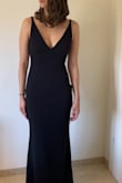 I loved this dress! It fits great and looks very elegant. The length just hit the floor with 2.5 inches hells (I'm 5'7"). The material is stretchy and a little warm. - Tammy S.