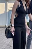 I loved everything about this jumpsuit! I was able to dance and move comfortably. Using the bathroom was a bit of a pain(to be expected).- I am normally an XS, but went with an XXS because I wanted it to fit a little tighter. But it turned out to be the PERFECT size! - I had very minor complaints about it.  I am fairly small chested, and there was extra fabric under my chest area that just wasn't holding the girls in. I was able to have it taken in luckily, which made the jumpsuit perfect. If you are short like me(5'1), you will definitely need it to be hemmed. Even with heels there was lots of extra fabric. The back lower part of the jumpsuit also tends to fold a bit just right at the top(which you can see in the photo). - All in all, after the very minor adjustments, it was the perfect outfit! - Brittany L.