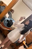 I grabbed a Large which I usually wear. I'm not an XL in any other brand so I didn't think to possibly size up. I'm a size 10-12 in pants and a size medium top. This dress was roomy in the arms which I wasn't expecting and hugged the right spots. Very flattering but is a bit short. I cannot bend over in it. Which is not what I was expecting since I'm not tall I usually have a problem with things being too long but not this dress! I love that it's not sheer and I could wear any color under garments with no problem! - Torey G.