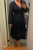 Super cute and comfortable. Shows quite a bit of cleavage but it can be adjusted a little by tying the dress as tight as possible. - Ashley D.