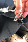 i am so bummed because i think this bag looks so cute and goes with most outfits. Unfortunately, the seam is already tearing and the strap that attaches to the bag is breaking after only 2 weeks. Lulus is my main online shopping site and never have had issues like this before so maybe it's just bad luck. - Shannon S.