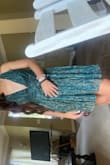 I loved how this dress looked, if you have small bust like me you may want to go with a different option unless you use dress tape which is what I ended up doing. It is the perfect length not awkwardly long or too short. Perfect for homecoming or a wedding! - Annika O.