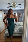 The green is vibrant and almost teal. This was for a wedding and was one of many dress options I had purchased. Overall, the dress design itself didn't wow me and can be tricky if you're busty. I did like it, but not enough to keep. - Imani T.