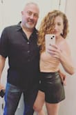 I have this in black and pink. I wear this shirt a lot! I probably could've gone with a small but I didn't want things too tight and I can wear a strapless bra with this. Again, I get so many compliments. The pink color is really pretty. - Stacey Z.