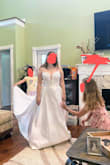 I chose this dress for my wedding. It fit me perfectly. The top isn't super comfortable since it's a structured corset but it's still wearable and I feel very beautiful in it. I'm 5'2 and the dress is LONG. I love the train but I'm getting the front hemmed so I can still walk in it. - Jessica S.
