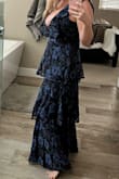 I was so in love when I saw this dress online and couldn't wait to get it. I planned on wearing it to a wedding. When it came, I was excited to see such great quality. I put it on and it fit perfectly and was so comfortable&except for the neckline. It must be my body shape, because it doesn't look scandalous on any of the other review pics, but it was just way too low cut for me. It could be that I'm not used to my postpartum chest, but I just couldn't do it and was super sad to have to return it. - Caitlin L.