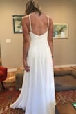 I liked the dress overall, a little plain but the biggest complaint I had with it was the neck-straps kind of dug into my throat and collarbones. I like the flowiness of the dress, if it wasn't as uncomfortable it would have been a top runner for my beach wedding. - Molly L.