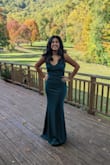 I absolutely loved this dress and received a lot of compliments when I wore it to a friend's wedding. The color is beautiful! It does run a little long - I'm 5'5" and the bought size M - and it was touching the floor with my 2.5 inch heels. So be aware of that and wear the right shoes. - Gunjan V.