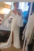 I chose this gorgeous Bohemian dress for my wedding day. The sleeves are just perfect. 
 I probably tried on 10 different Lulu dresses and this was my last and final one before I was going to give up.
Large chested girls be a little mindful there is no give in this dress.  A large would have been way too big on me and a small would have been way too small.  The medium fits perfect but it is a little snug on my chest area. I'm definitely not wearing a bra with this dress and I will be okay. I'm 5'4 so the dress is long on me but I'm not going to hem it. 
It has a beautiful long train I am going to get a bustle put on it. It's worth every penny, a gorgeous dress for every hippie spirited girl. - Sarah B.