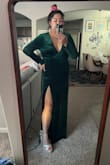 I bought this for an upcoming military ball and it fits me perfectly. I did add skims underneath just to smooth out my curves and it's perfect. I ended up getting platform shoes and I'm glad I did. The dress is a lot longer than I expected but I love the look. I plan on getting boob tape though for the day. - Kelly W.