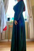 I had been eyeing this dress for about a month before I decided to go for it, and Im so glad I did. Im 55 and will need to wear 3 in heels for it to be a good length. I usually wear a size large in clothing, and the large fit perfectly. If you have a larger bust, than you will need to size up. I will also need to pin the boob to make sure I stay decent at the wedding, but I'm very satisfied. It wraps around in the rib area, accentuating the smallest pet of my figure. The material is flowy and nice, and not see through at all. Glad I went for the purchase. - Asha M.