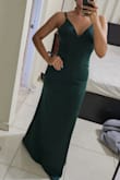 This dress fits like a glove. The fabric feels very high quality, the color is gorgeous. I ordered size xsmall, Im 5'4" and 120 pounds. - Claudia P.