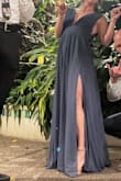 I wore this to a black tie wedding after trying several other dresses. This was SO flattering, the color was even better in person (much more of a Smokey blue- soooo pretty), and aside from needing a hem it fits great with a little fashion tape. The deep plunging V came about to the bottom of my sternum and was just what I was looking for. Can't wait to wear it again! - Ann S.