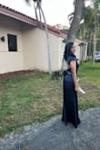 I absolutely love and do not regret buying this dress. Received many compliments throughout the night. This dress is very long even with heels for a short girl like me so I did have to get it tailored at the bottom which is no big deal for me as I'm used to that due to my height. - Birmania G.