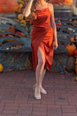 This dress was perfect for the fall wedding that I recently attended. Initially when I tried it on I was skeptical as it was wrinkled from shipping. However, once I steamed it the fit was perfect! The dress was a bit loose in the waist, but that is just how it is described on Lulus website, and I found it extremely flattering! As far as the color of the dress, I found it looked even better in person as it was the most beautiful rust color. I loved that the straps were adjustable and how comfortable this dress was to dance the night away in. With that, I definitely think this dress is worth buying as it is both affordable, looks, and feels high quality! - Ashley B.