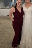 I loved this jumpsuit! I wore it to a wedding and thought it was so comfortable. The back way my favorite part. Unfortunately, I needed a large for my hips and thighs and only needed a medium for my top half, so I did have to pin the sleeves to keep it up as well as pin the busy cause it was a little deeper then I liked. I was wearing 6inch heels but will need to get it hemmed if I wear shorter ones. As other reviews, the zipper sucks, I had such a difficult time getting it up past the hip area so it makes using the bathroom difficult. But overall it's very pretty and very comfortable. - Jaylynn S.
