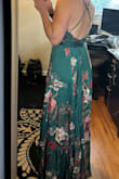 I looove this dress. I bought it for a destination wedding and it fits like a glove. It is a little long for me at 5'5 but I like wearing heels so it will be fine. Also, I did size down based on other reviews and I'm glad I did. I have a small rib cage though so I would say base the size you get off your rib cage size since that's where it's tight. The only other thing I will note is that it wrinkles. So the packability isn't great and I will have to iron/steam it when we land. - Solana B.