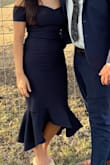 This is a perfect wedding guest dress and it fits great. I have a narrow waist so I ordered the xs. It was a little snug but I expected it to be. Would definitely recommend this dress!!! - Savannah F.
