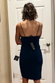 Fits great! Material was better than expected. It looks more elegant than in pictures. Wearing it for wedding. Great price. Would've bought it even without the promo discount. Got an XS - Tiffany