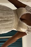 I loved this dress!! The other reviews were right that the bust area was not great if you don't have a really small chest. Boob tape will be your best friend. It was a really soft and pretty dress! - Victorea Q.